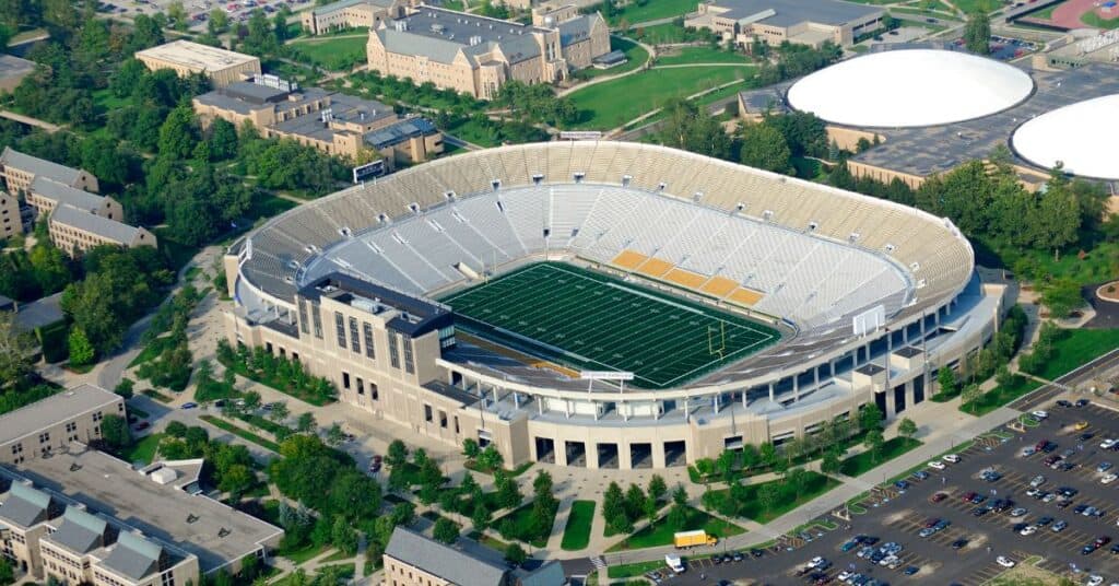 why are college football stadiums bigger